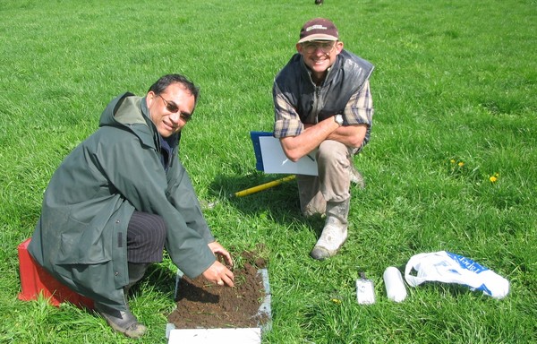 EW's Bala Tikkisetty (left) talks soil with Te Awamutu farmer Graham Smith